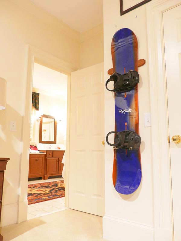 Snowboard rack in a classy bedroom