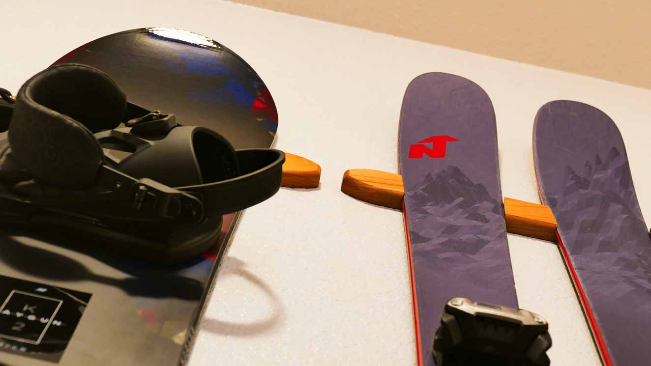 Snowboard mounted in a bedroom